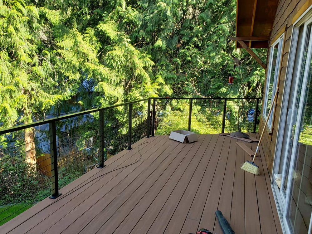 modern-cable-deck-railing-ideas-in-a-rustic-lakeside-setting