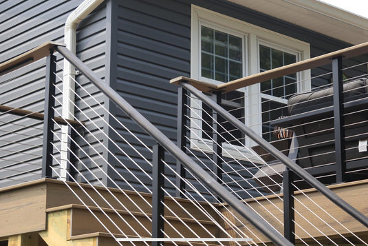 Lush Green Outdoor Deck Cable Railing