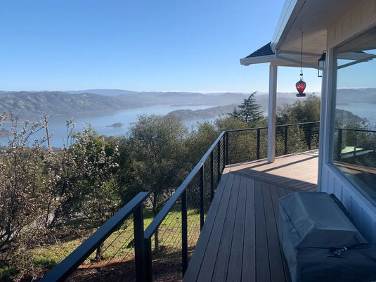 Sleek Outdoor Cable Railing Unveils Lake Views