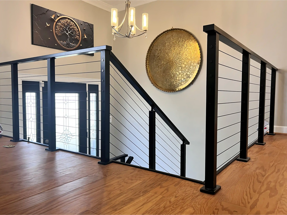 black_cable_stair_railing_in_wood