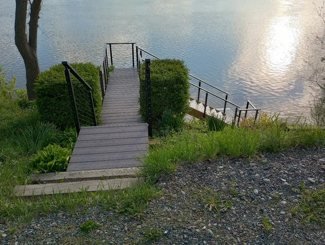 cable-railing-for-modern-lake-house-deck.webp