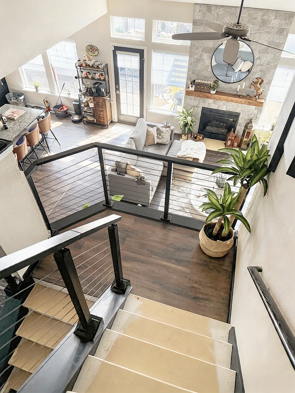 Modern interior staircase with Muzata black cable railing system