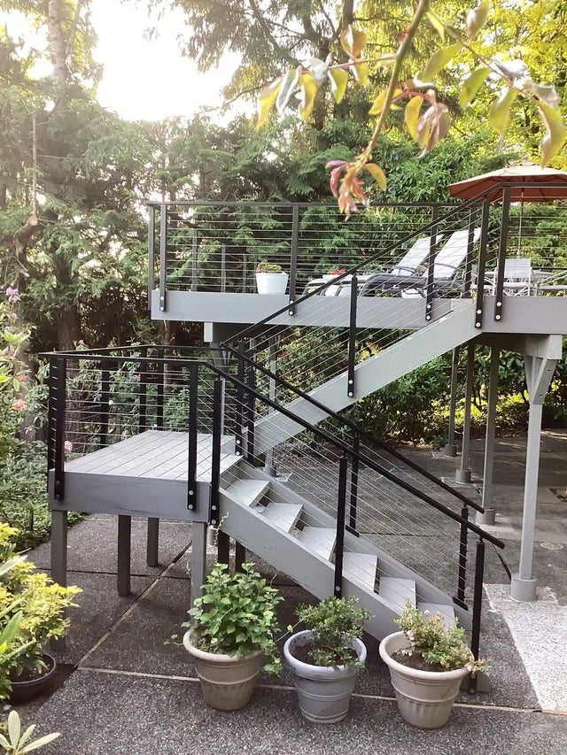 outdoor-staircase-with-modern-cable-railing.webp
