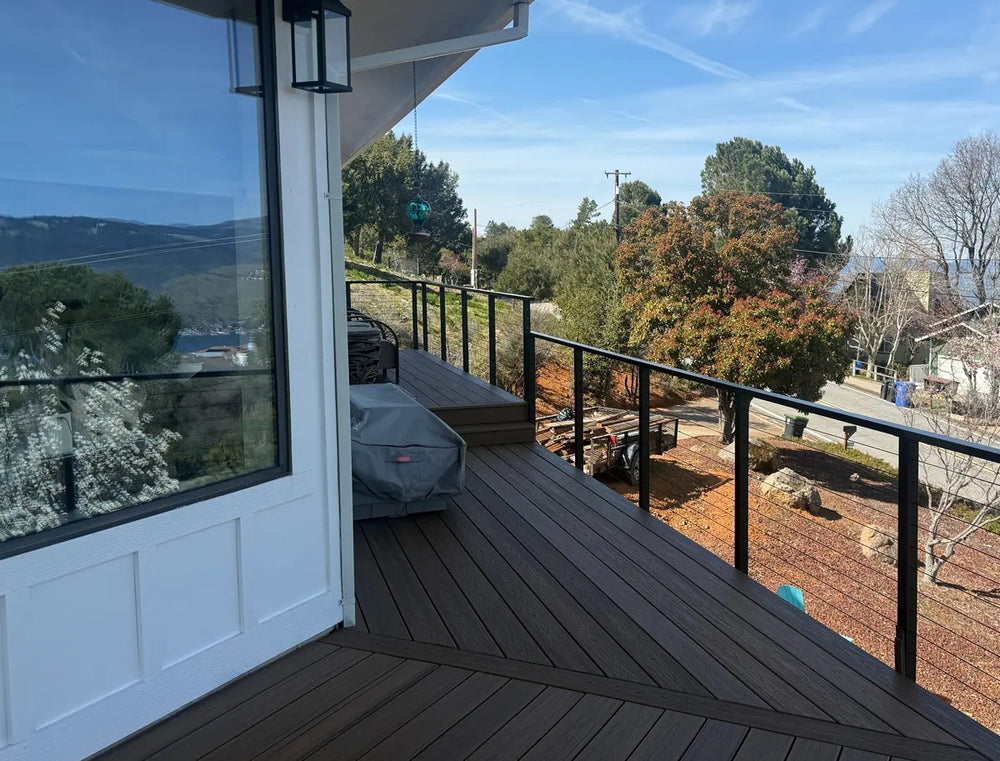 peaceful-patio-with-outdoor-cable-railing-and-water-view