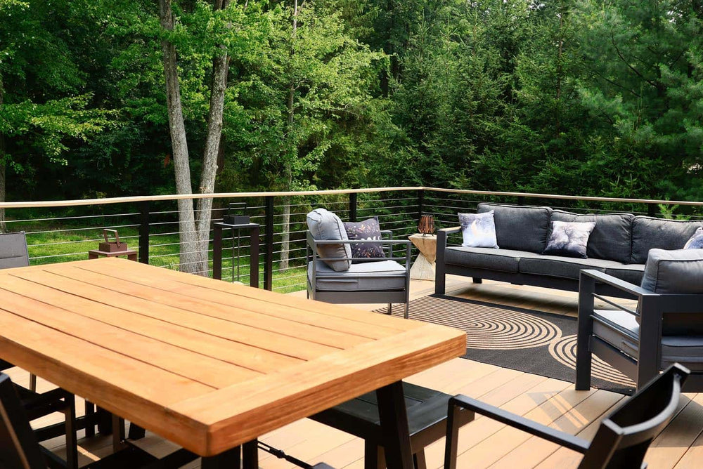 sleek-cable-deck-railings-adorning-a-scenic-backyard-deck-area